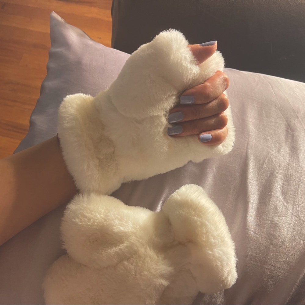 White fuzzy faux fur finger free mittens. NEVER WORN. SUPER CLEAN.